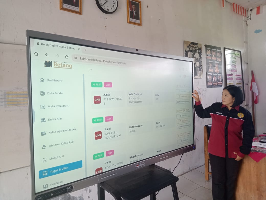 PEMANFAATAN TV DIGITAL DAN APLIKASI HUMA BETANG 